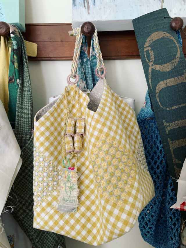 @greatbritishquilter challenge , and today is top tips. 
I’m going with, Just Get On With It, Just actually Start.
Sometimes I spend so long thinking about an idea or a fabric that it doesn’t really become achievable as I’ve spent so long thinking, looking , researching that in all that time I could have started stitching. The idea that I know how it will all look when finished cannot be that helpful. Most of my completed quilts and projects evolve once I start stitching.
My latest finish is a case in point.
A classic Japanese rice bag, with some chicken scratch embroidery.
Decisions on the top closure, hand covered loops, and a hand made cord.
And now for some bag charms which seem to be the fashionable thing at the moment! 
An embroidered thread saver and some Indian inspired fabric beads, all on a crocheted string.
Who knew when I started that’s how it would turn out?
#greatbritishquilter #slowstitch #usewhatyouhave #getstitching #carolynforster
