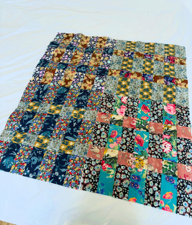 @seam_collective and the prompt is Growth, I’m guessing it’s for day 20 as I’ve not checked the chart and I fell off the wagon for a few days 🤣.
Although I mostly create from traditional patchwork blocks and old quilts from endless research books and museum archives, I look a lot at some favourite textile artists.
Someone who amazes me with their creativity and productivity is @miesjechafer . 
Her colours are so much fun!
I tried out her Criss Cross pattern last week . I was away and only had fabric strips from the quilt I had taken with me to work on. For me this is when I can grow and learn. With only a limited amount and palette of fabrics, I really have to think! 
It’s all very nice when I can just sew without thinking much about it. But when I only have certain things to work with, you do have to think and I felt learn more about what the fabrics will do and look like for you.
Hopefully that growth then works its way into my other projects! 
Thanks @miesjechafer for the fun pattern, you can find it on her site through the links.
#scrapquilt #septtextilelove #miesjechafer #quiltinprogress #carolynforster